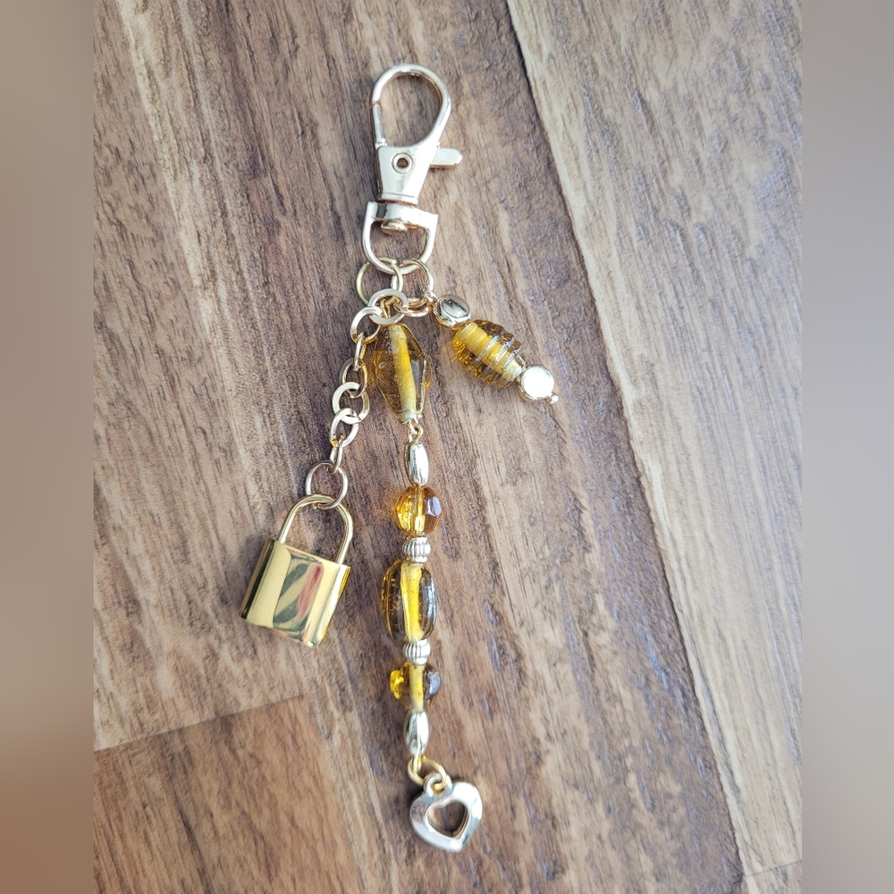 New Gold Tone Amber Glass Beads With  Lock Charm